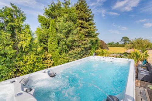 Caesars Spa Retreat with Heated Swim Spa & Waterfall Gardens