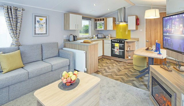 Comfortable, modern two-bedroom caravan sleeping four people.