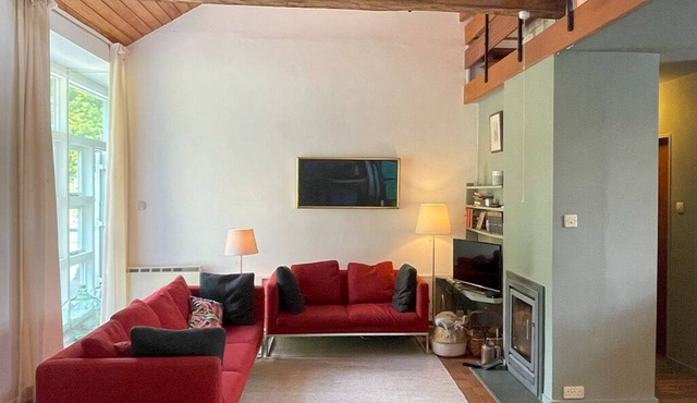 Iconic 1960's Architect-Designed Modern Barn with terrace and stunning gardens.