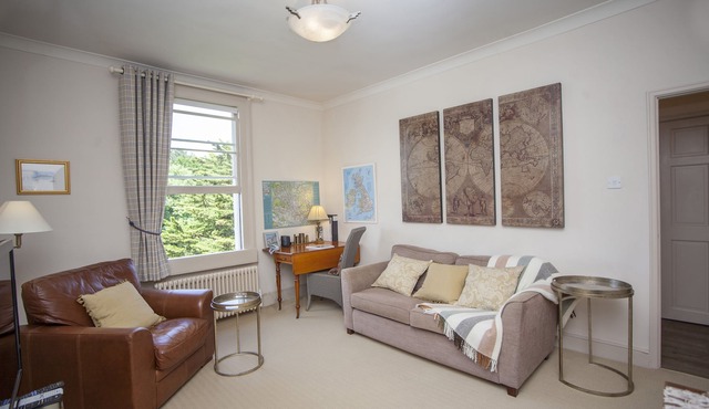 Marlborough Heights | A chic top-floor flat, furnished in style, with stunning views