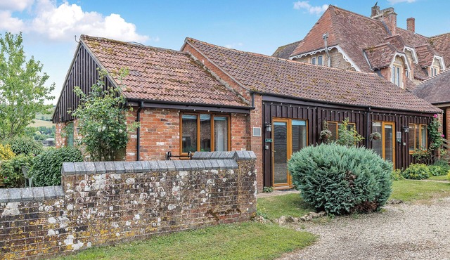 Pet-friendly cottage with open-plan living and a private walled garden.